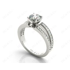 Round Cut 4 Claw Split Shank Engagement Ring with Grain Set Side Stones in Platinum