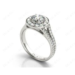 Round Cut Halo Diamond Engagement ring with claw set centre stone in Platinum
