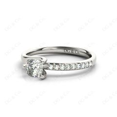Cushion Cut Diamond Ring with Three Prong Set Centre Stone and Pavé Set Side Stones in Platinum