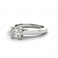 Round Cut Classic Solitaire Four Claw Diamond Engagement Ring with Micro Pavé Set Prongs in Platinum
