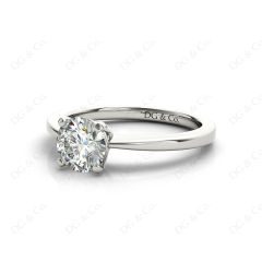 Unique Round Cut Classic Four Claws Diamond Solitaire Engagement Ring in Platinum