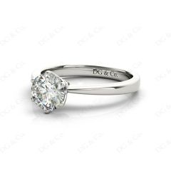 Platinum Brilliant Cut Six Claw Set Diamond Ring On A Upswept Reverse Taper Band.