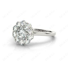 Round Cut Halo Diamond Engagement ring with claw set centre stone in 18K White