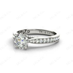 Round Cut Four Claw Set Diamond Ring with Pave Set Stones Down the Shoulders and on Both Sides in 18K White
