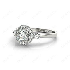 Round Cut Halo Trilogy diamond ring with pave set side stone in 18K White