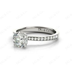 Round Cut Four Claw Set Diamond Ring with Round Cut Diamonds Pave Set Down the Shoulders in Platinum