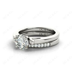 Round cut diamond wedding set rings with channel set shoulders in 18K White