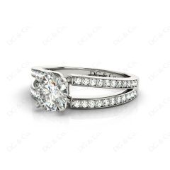 Round Cut 4 Claw Split Shank Engagement Ring with Grain Set Side Stones in Platinum