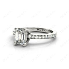 Emerald Cut Four Claw Diamond Ring with grain set side stones in Platinum