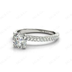 Round Cut claw set diamond ring with micro pave set side stone in Platinum