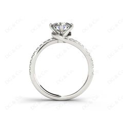 Round Cut Split Shank Diamond Engagement Ring with a Twist Band and Pave Set Side Stones in Platinum