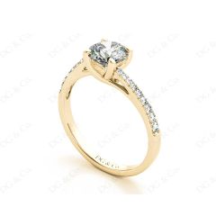 Round Cut Four Claw Set Diamond Ring with Pave Set Diamonds Down the Shoulders in 18K Yellow