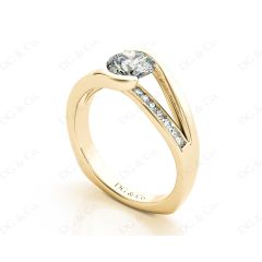 Round Cut Cross Over Ring Half Bezel Set Diamond Engagement Ring with Channel Set Side Stones in 18K Yellow