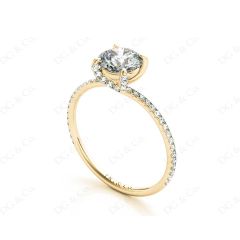 Round Cut Cross Over ring claw set diamond with pave set side stone in 18K Yellow