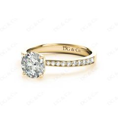 Round Cut Four Claw Set Diamond Ring with Round Cut Diamonds Pave Set Down the Shoulders in 18K Yellow