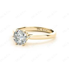 Round Cut Six Claw Set Diamond Ring on a Plain Band in 18K Yellow