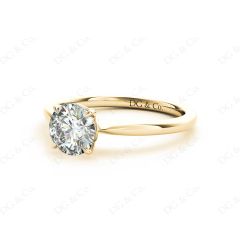 Round Cut Four Claw Set Diamond Ring With a Plain Band in 18K Yellow