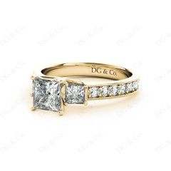 Princess Cut Trilogy Ring with Milgrain set shoulder diamond in 18K Yellow