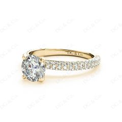 Round Cut claw set diamond ring with micro pave set side stone in 18K Yellow