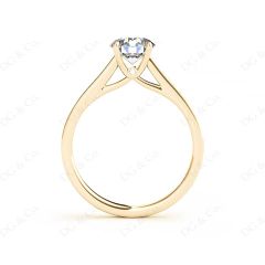 Round Cut Four Claw Set Diamond Ring with Round Cut Channel Diamonds Down the Shoulders and on the Setting in 18K Yellow