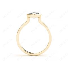 Round Cut Bezel Set Solitaire Engagement Ring With a Plain Band in 18K Yellow