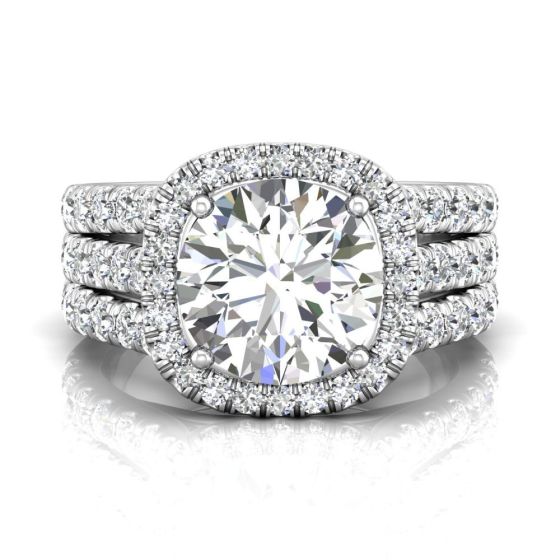 Round Cut Halo Diamond Engagement Ring With Four Claw Setting Centre Stone Triple-split Shoulders Pave Setting on the band.-Platinum