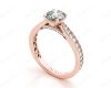 Round Cut Four Claw Set Diamond Ring with Pave Set Stones Down the Shoulders and on Both Sides in 18K Rose