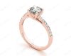 Round Cut Four Claw Set Diamond Ring with Pave Set Diamonds Down the Shoulders in 18K Rose