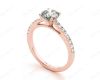 Round Cut Four Claw Set Diamond Ring with Round Pave Set Stones Down the Shoulders in 18K Rose