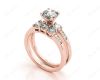 Round Cut Diamond trilogy wedding set rings with claw set side stone in 18K Rose