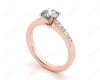 Round cut diamond ring with four claws set centre stone in 18K Rose