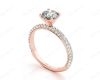 Round Cut claw set diamond ring with micro pave set side stone in 18K Rose