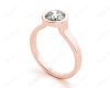 Round Cut Bezel Set Solitaire Engagement Ring With a Plain Band in 18K Rose