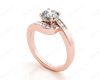 Round Cut Four Claw Set Diamond Ring with Channel Set Stones Down the Shoulders in 18k Rose