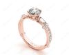 Round Cut Vintage Style Three Stone Engagement Ring with Tapered Baguette Bezel Set and Pavé Set Side Stones  in 18K Rose