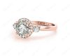 Round Cut Halo Trilogy diamond ring with pave set side stone in 18K Rose