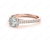 Round Cut Four Claw Set Diamond Ring with Round Cut Channel Diamonds Down the Shoulders and on the Setting in 18K Rose