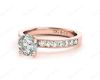 Round Cut Four Claw Set Diamond Ring with Channel Set Side Stones Down the Shoulders in 18k Rose