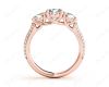 Round Cut Trilogy Diamond Engagement ring with claw set center stone in 18K Rose