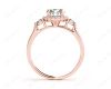 Round Cut Halo Trilogy diamond ring with pave set side stone in 18K Rose