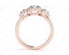 Round Cut Triple Halo Diamond Engagement ring with claw set centre stone in 18K Rose