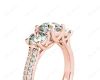 Round Cut Trilogy Diamond Engagement ring with claw set center stone in 18K Rose