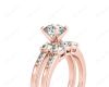 Round Cut Diamond trilogy wedding set rings with claw set side stone in 18K Rose