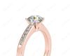 Round cut diamond ring with four claws set centre stone in 18K Rose