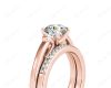 Round cut diamond wedding set rings with channel set shoulders in 18K Rose