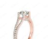 Round cut diamond ring with claw set centre stone in 18K Rose