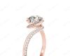 Round Cut Twist band claw set diamond with grain set side stone in 18K Rose