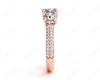 Round Cut Trilogy Diamond Engagement ring with claw set center stone in 18K Rose