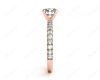 Round cut claw set diamond ring with pave set side stone in 18K Rose