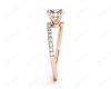 Round cut diamond cross over ring claw set diamond with pave set side stone in 18K Rose